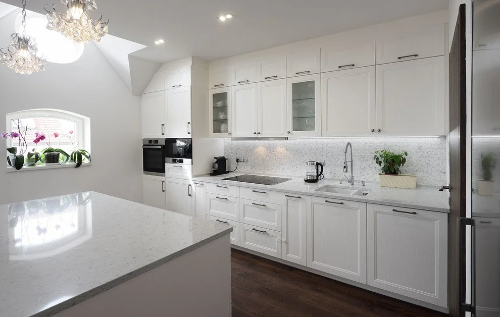 Contemporary kitchen with warm wood finishes and a generous island